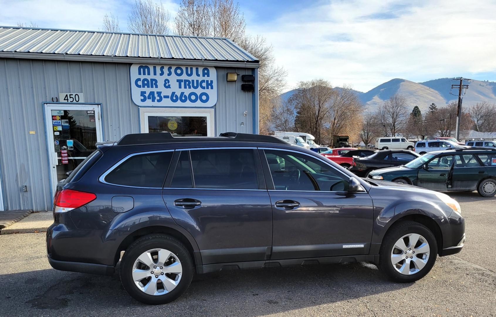 2010 Grey /Blue Subaru Outback Premium (4S4BRBCC7A3) with an 2.5L engine, Automatic transmission, located at 450 N Russell, Missoula, MT, 59801, (406) 543-6600, 46.874496, -114.017433 - Automatic Transmission. Power Drivers Seat. Heated Seats. Air. Cruise. Tilt. AM FM CD. Bluetooth. Newer All Season Tires. Tow Hitch. - Photo#0